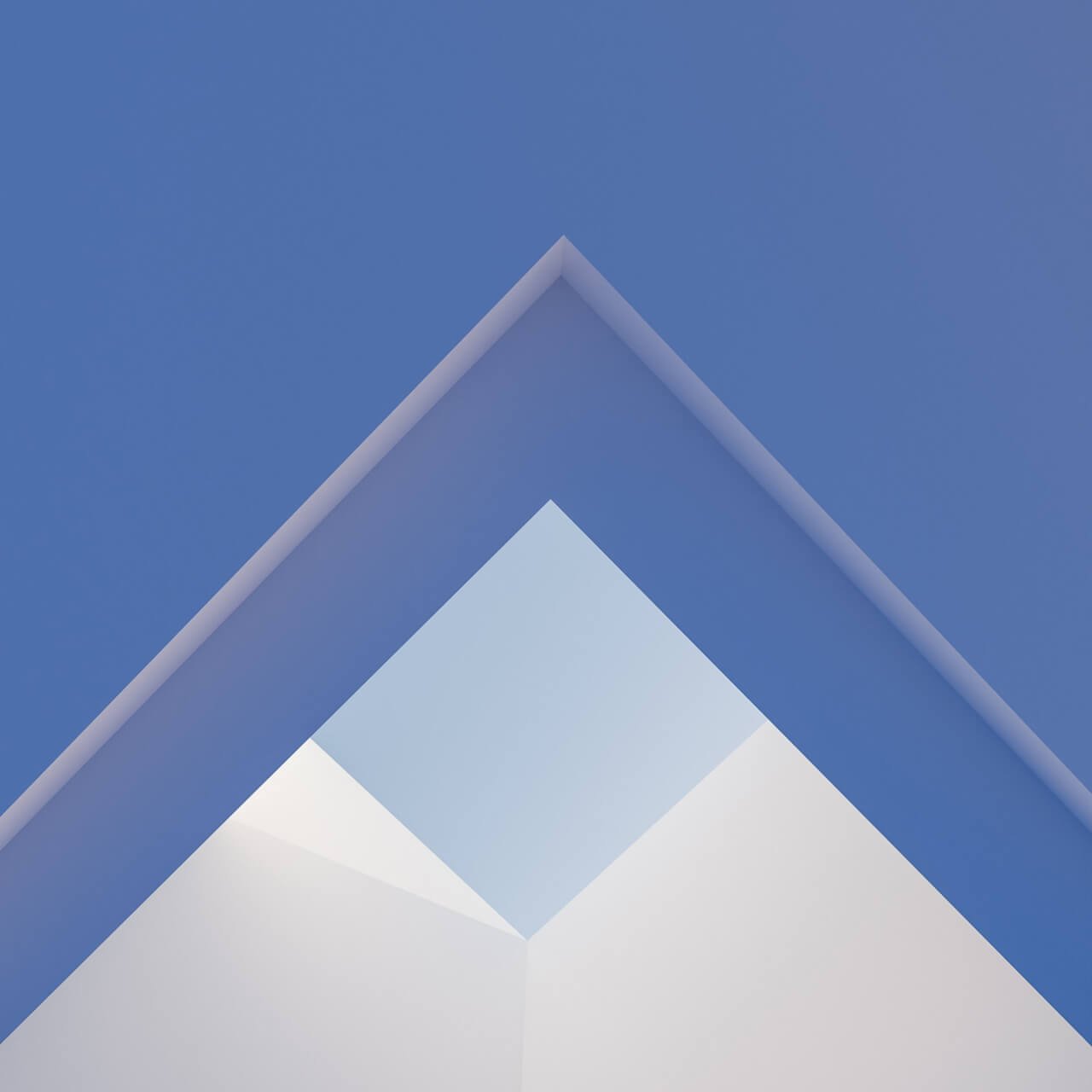 Geometric architectural form against a blue field
